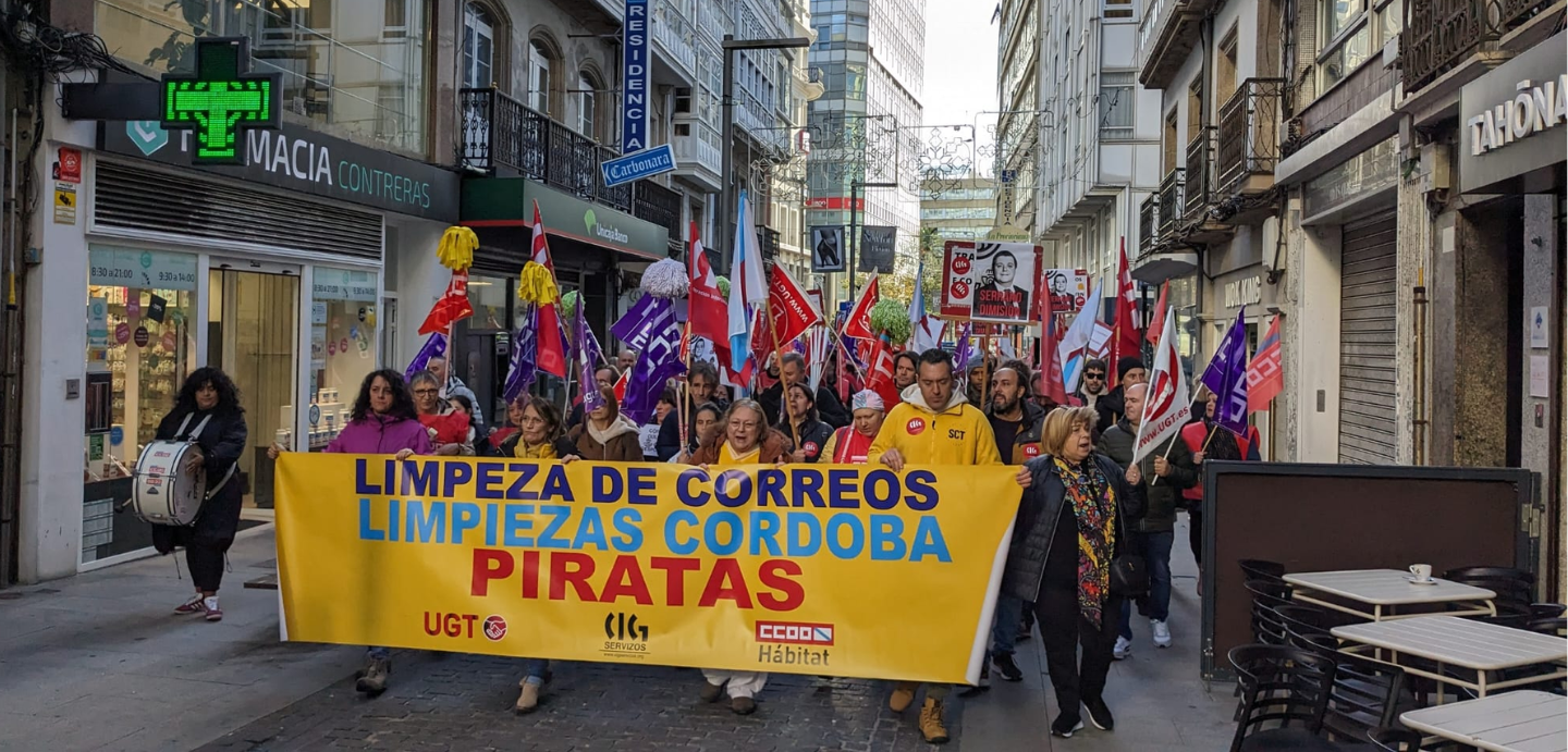 Imaxe da cabeza da manifestación pola Rúa Real da Coruña